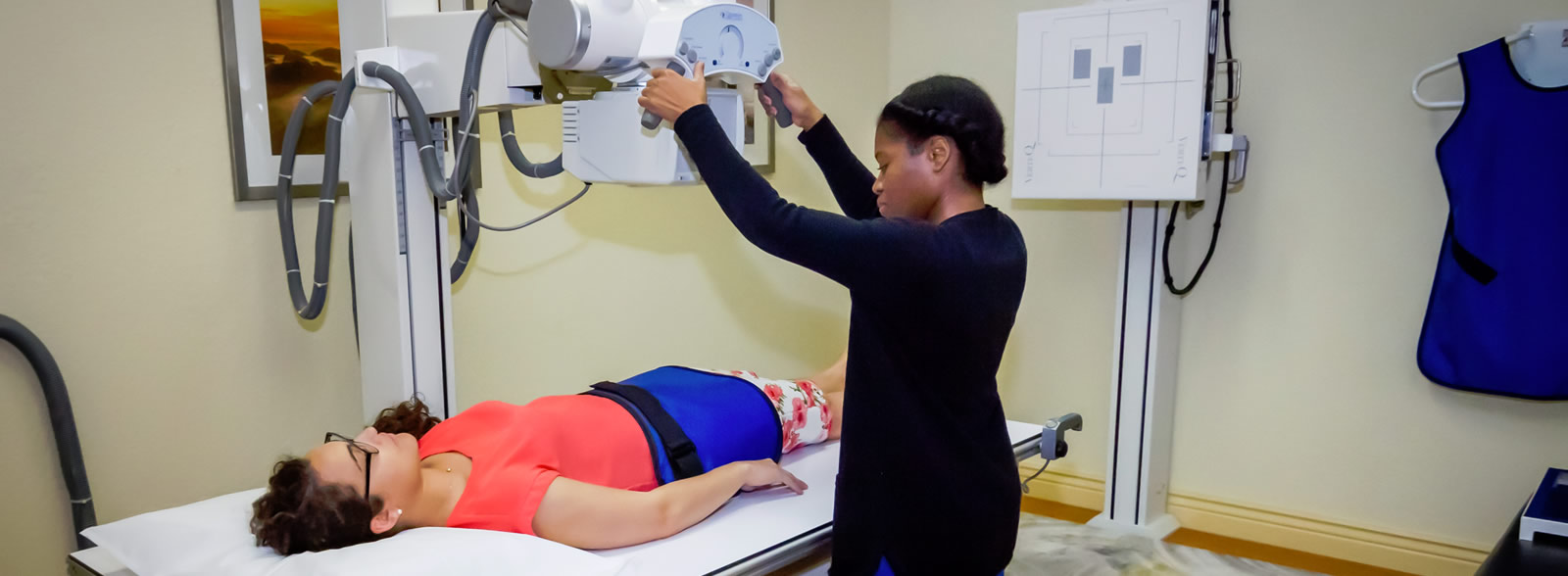 Nurse performing an X-Ray